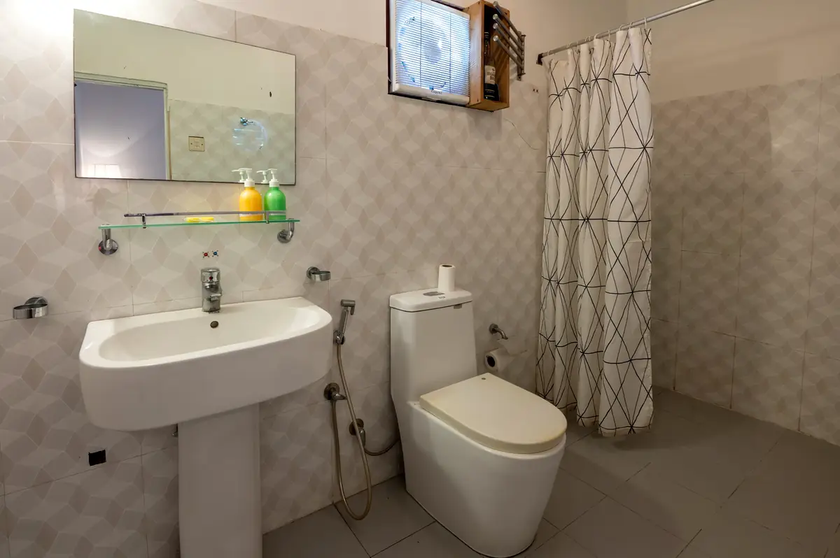 Deluxe Queen private bathroom with shower